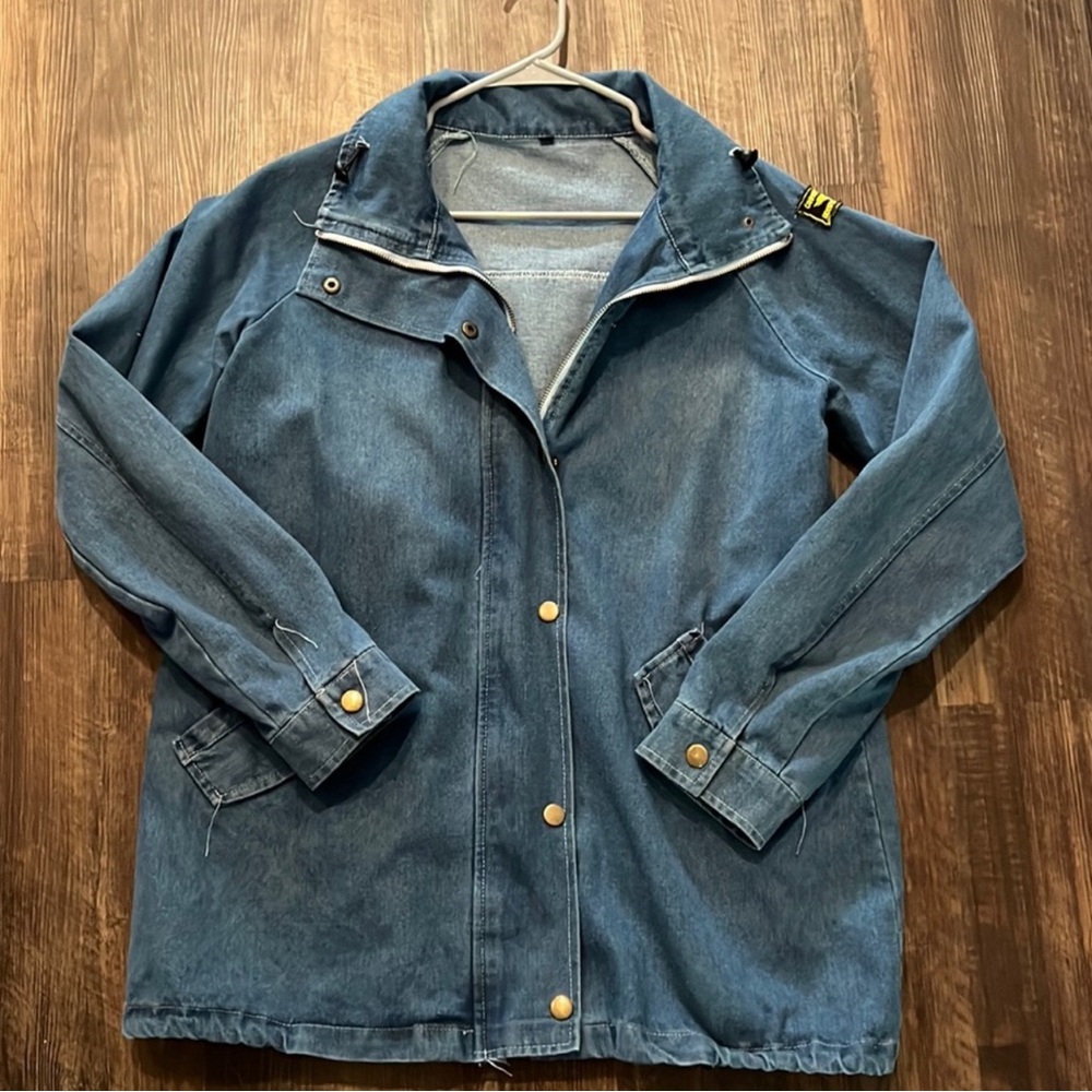Denim oversized jacket. Says medium but closer to Large. Zip up & buttons